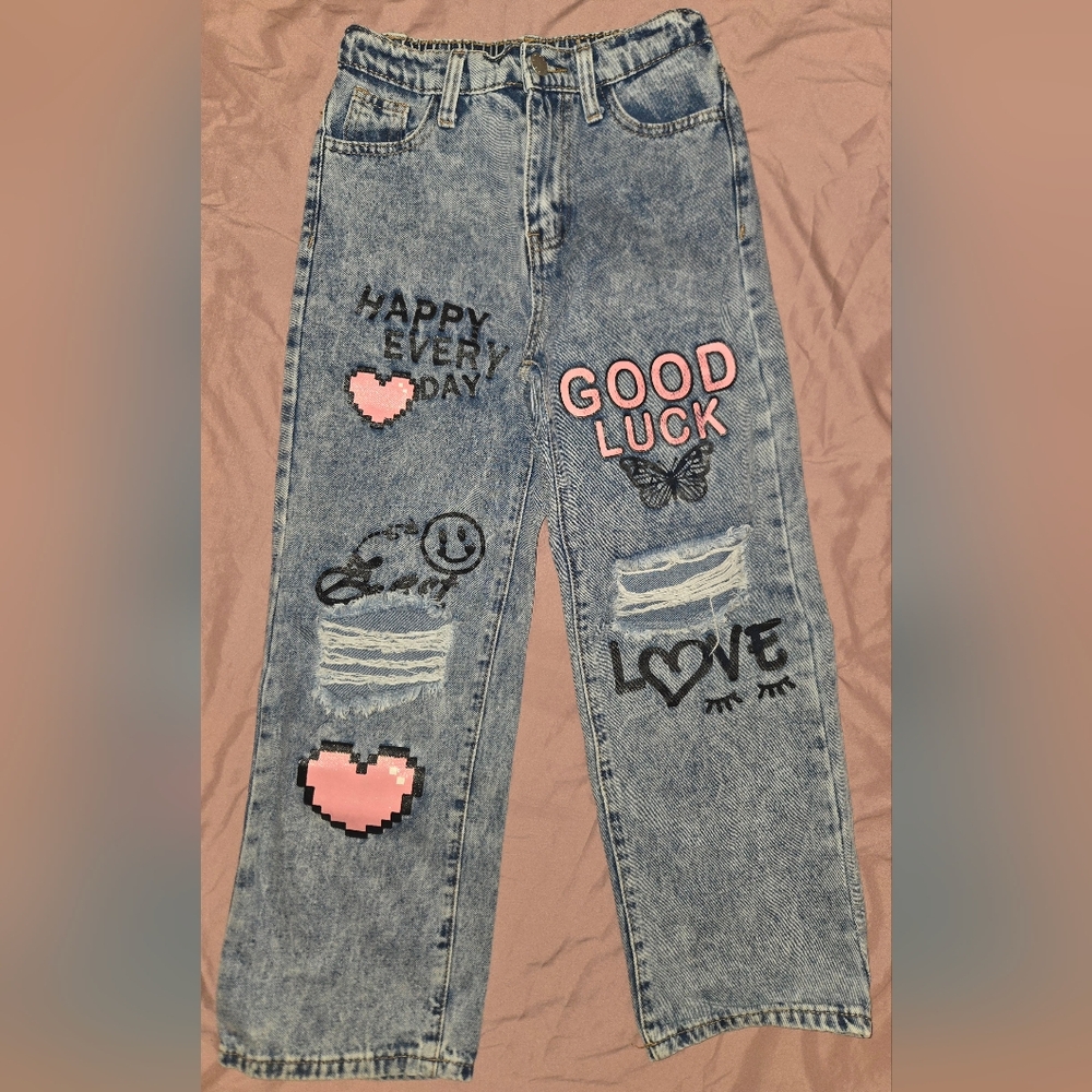 SHEIN Girls Blue Jeans with Rips And Pink and Black Graphics